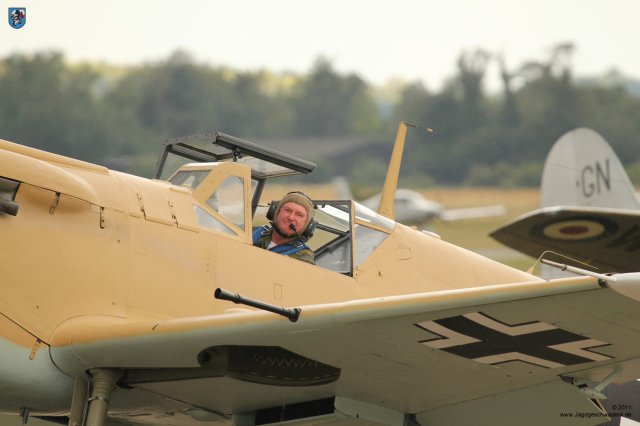 0065_Flying_Legends_2011_Hispano_HA-1112_M1L_Buchon_G-AWHE_Pilot